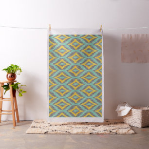 Tela Ikat de Quatrefoil verde y amarillo y gris 