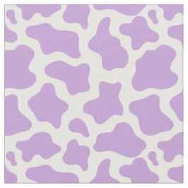 Tela kawaii con estampado de vaca morado pastel