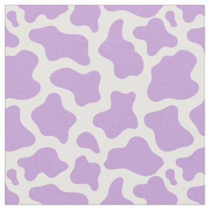 Tela kawaii con estampado de vaca morado pastel