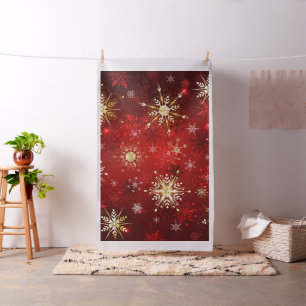 Tela Navidades Copos de nieve dorados con fondo rojo