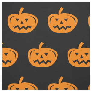 Tela negra de Halloween con calabazas naranjas tal