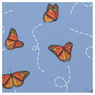 Tela patrón de mariposas briezosas