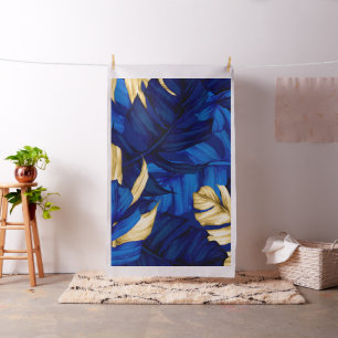 Tela Patrón exótico de selva tropical azul y dorado