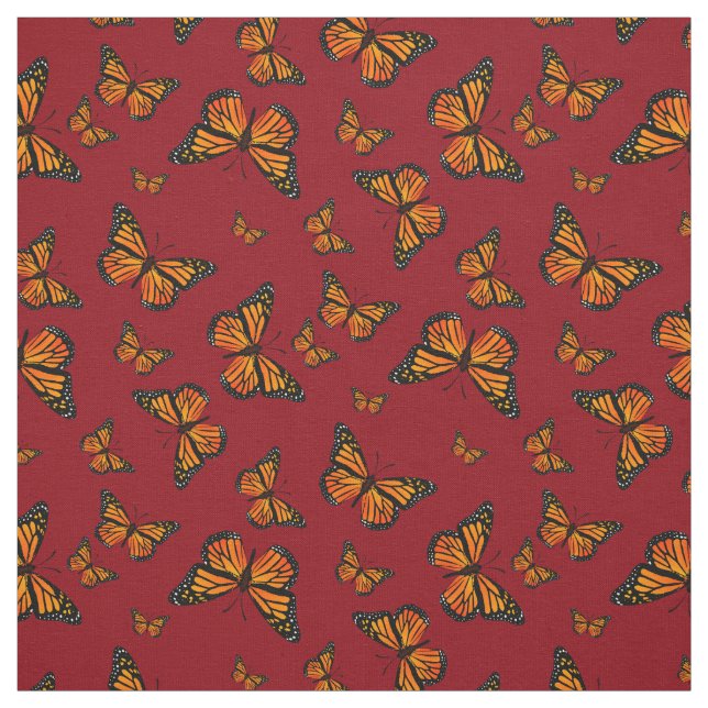 Tela Patrón mariposa monarca en fondo rojo oscuro (Retal)