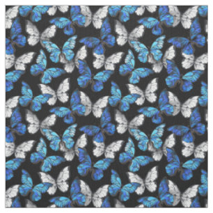 Tela Patrón oscuro sin foco con mariposas azules morfo