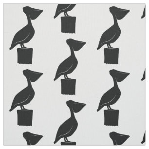 Tela Pelícano en un poste en silueta