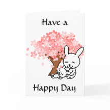 Ten un día feliz, conejitos bajo la tarjeta de árb