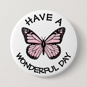 Tenga un botón hermoso de la mariposa de monarca