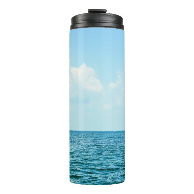 Termo Agua del océano, cielo azul claro. (Anverso)