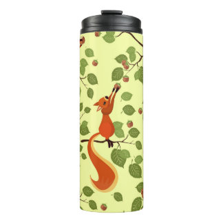 Termo Ardilla roja en ramas de avellano.