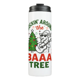 Termo Balanceándose alrededor del árbol con una cabra fr