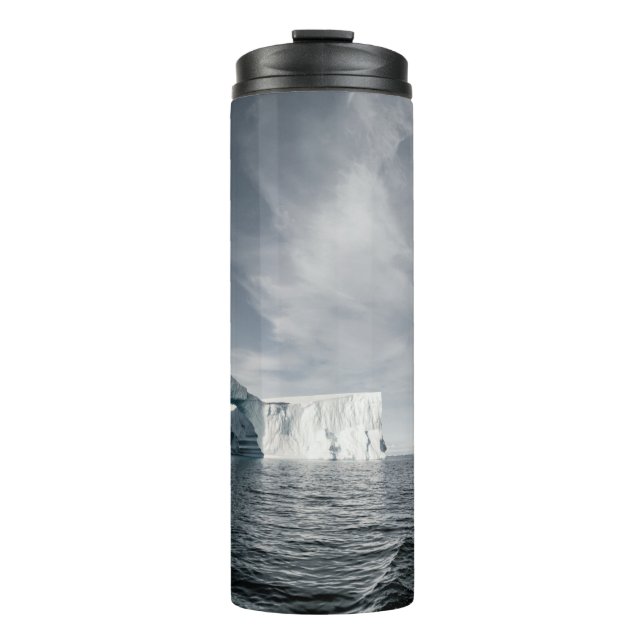 TERMO BARCO MARRÓN CERCA DE GLACIER DURANTE EL DÍA (Anverso)
