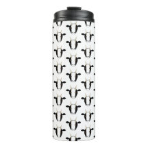 Cabras blancas y negras en Tumbler