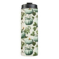 Calabazas verdes sabrosas y flores otoñales