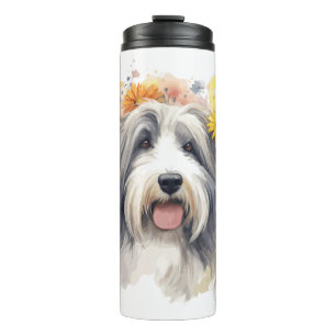 Termo Collie con barba entre flores silvestres 1