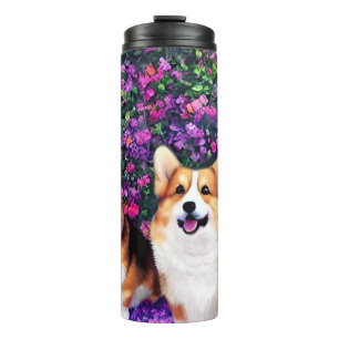 Termo Corgis gemelos en el jardín