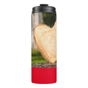 Termo de madera con corazón