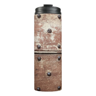 Termo Detalle de una antigua puerta pintada de mal gusto