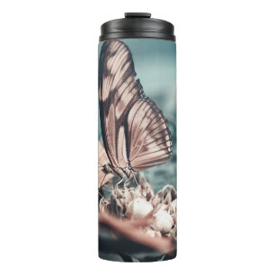 TERMO DOS MARIPOSAS MARRÓN Y NEGRO EN LA PARTE SUPERIOR