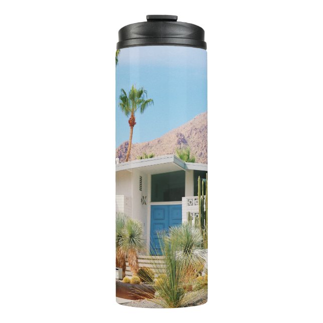 TERMO EDIFICIO DE CONCRETO BLANCO Y AZUL CERCA DE ÁRBOLE (Anverso)