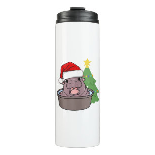 Termo el lindo Moo Deng hippopotamus está usando Santa h