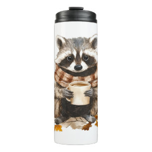 Termo El otoño deja raccoon acogedor con taza de café