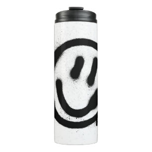Termo emoticono facial sonriente de graffiti en negro so