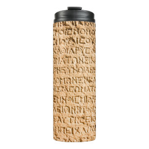 Termo escritura griega antigua cincelada en piedra