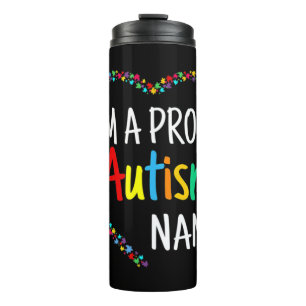 Termo Este colorido corazón de autismo hecho con piezas
