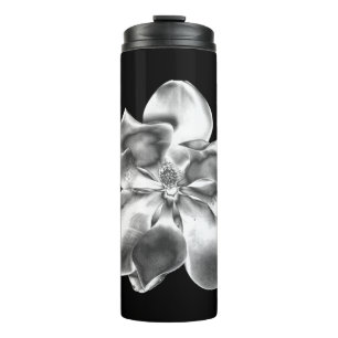 Termo Flor de magnolia metálica en un tumblador térmico