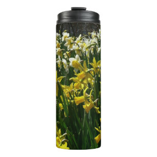 Termo Flores de primavera de los Daffodils amarillos y b
