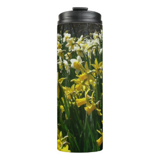 Termo Flores de primavera de los Daffodils amarillos y b