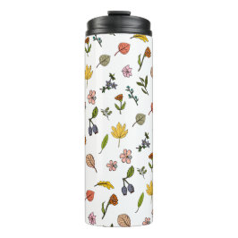 Termo flores y hojas rojas y amarillas rosas de otoño