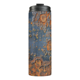 Termo Fondo metalizado oxidado texturizado.