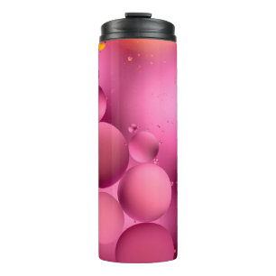 Termo foto, gotas oleosas brillantes en el agua con ba c