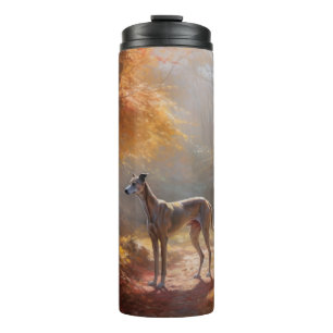 Termo Galgo entre hojas de otoño que caen inspira