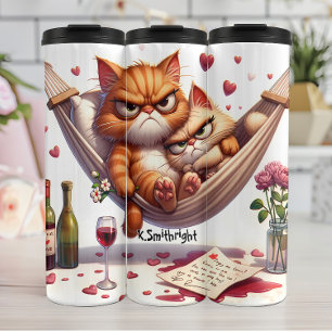 Termo Gatos gruñidos en una hamaca