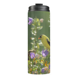 Termo Goldfinch en una flor harebell