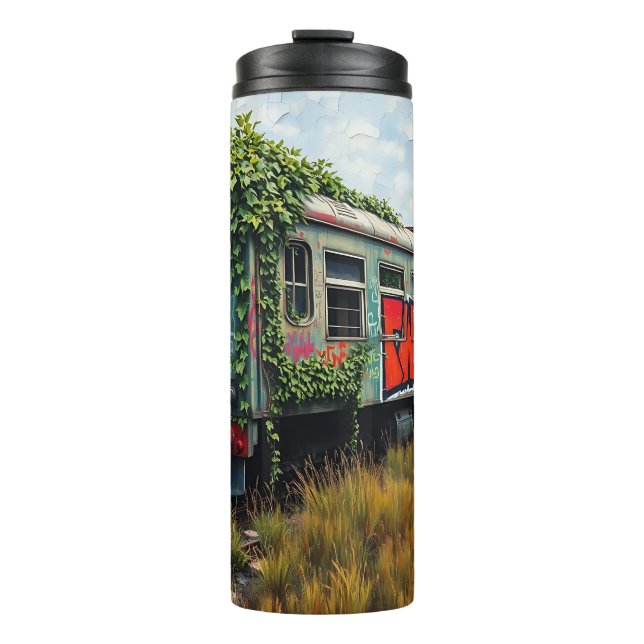 Termo Hiedra y grafitis cubren tren abandonado (Anverso)