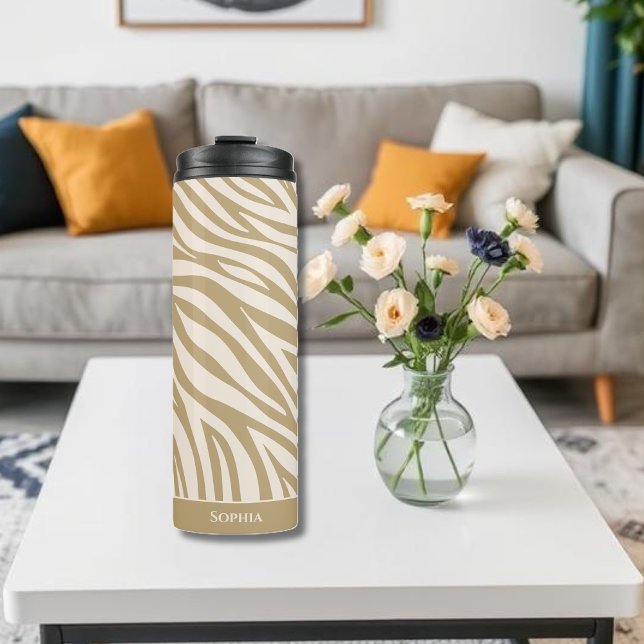 Termo Imprimir cebra-beige (Sip in Style with Our Neutral Zebra Print Thermal Tumbler – Where Chic Meets Function.
Stay hydrated)