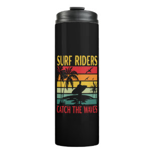 Termo Jinetes de surf atrapan las olas