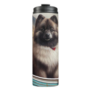 Termo Keeshond sobre un remo: una aventura escénica