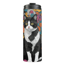 Termo Kitty entre las flores