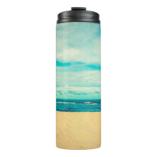 Termo La hermosa playa tropical y el paisaje marino 