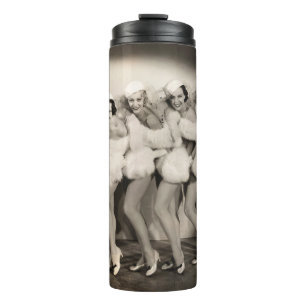 Termo Line of chorus girls in white furvintage, retro, 1