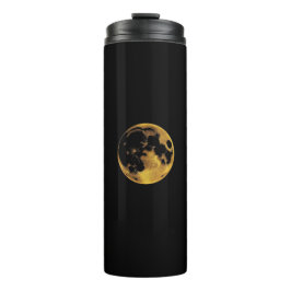 Termo Luna texturizada dorada sobre negro oscuro