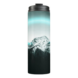 Termo Misteriosa luz de neón azul de montaña nevada