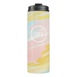 Termo Monograma de mug tumoral aislado de pintura en pas