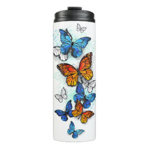 Termo Morfo y monarca de las mariposas voladoras