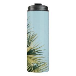 Termo Palmera de ventilador bajo cielo azul